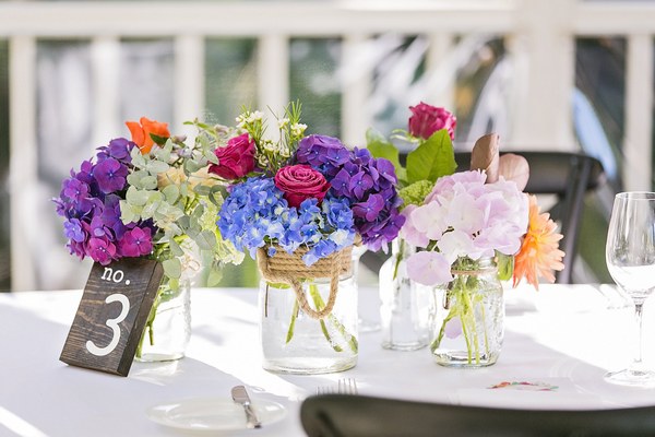 wedding reception centerpiece with colorful flowers