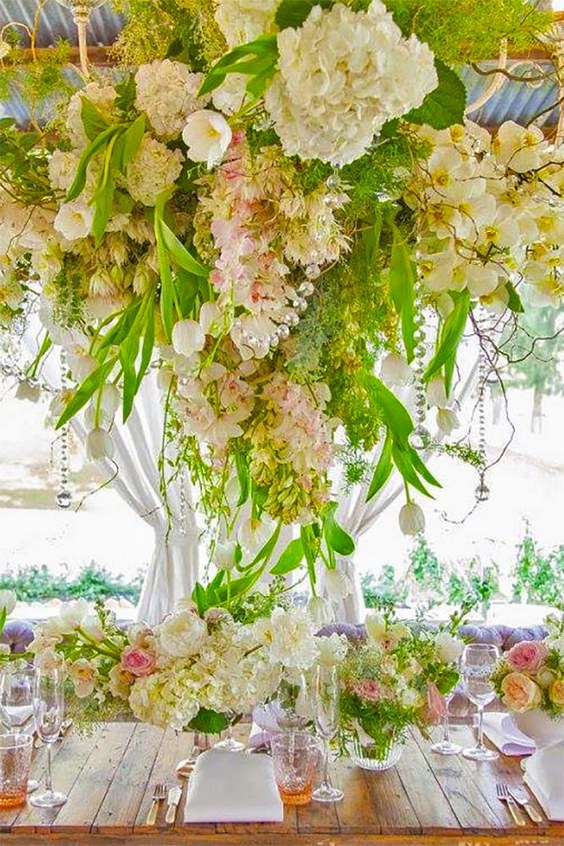 white and green wedding venue flower decoration ideas via vorsprung studio