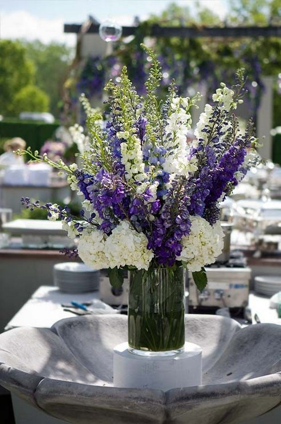 white and purple wedding centerpiece