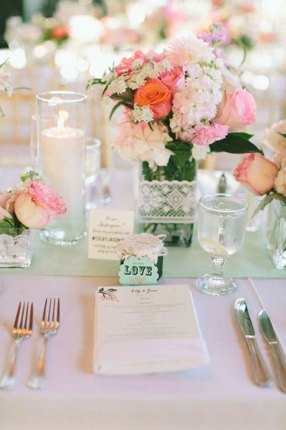 mint table runner candles and short centerpieces