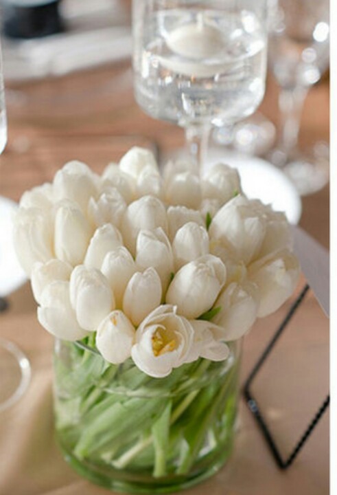 all white floral arrangements