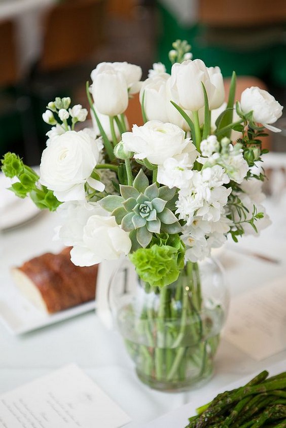 succulents tulips and ranunculus white wedding centerpiece