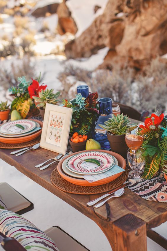 Colorful desert themed succulent wedding tablescape via Tyler Rye Photography
