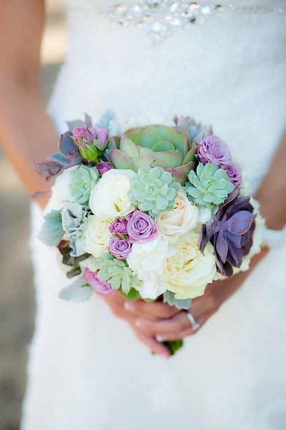 purple, cream, & succulents wedding centerpiece