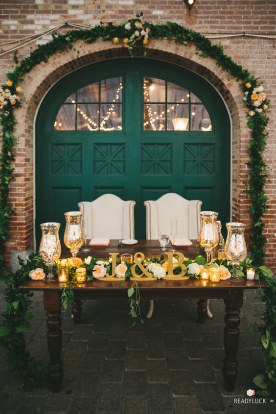 Candlelit bride & groom sweetheart table