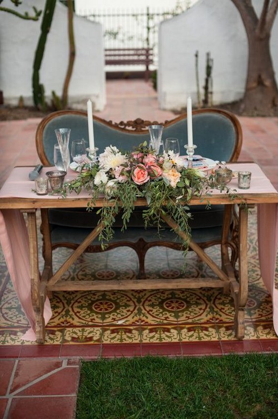 Vintage Garden Sweetheart Table via Photo by Brett Hickman