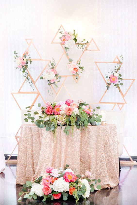 rose gold glitter sweetheart table decor via Amy & Jordan Photography