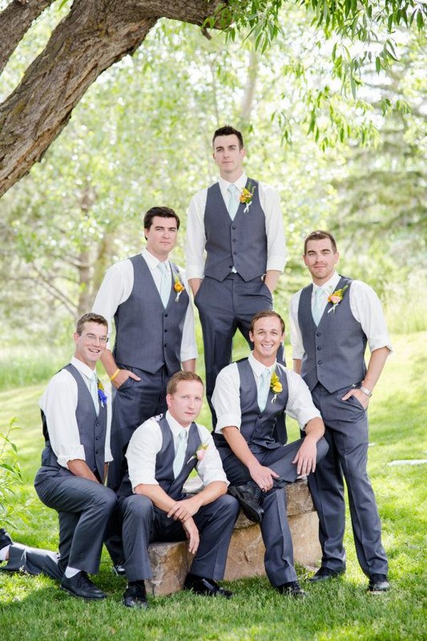 Groomsmen in elegant formal but handsome pose with groom for bridal party pic