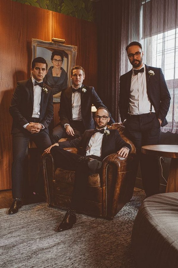 Handsome groomsmen getting ready pose in a very Vogue style shoot