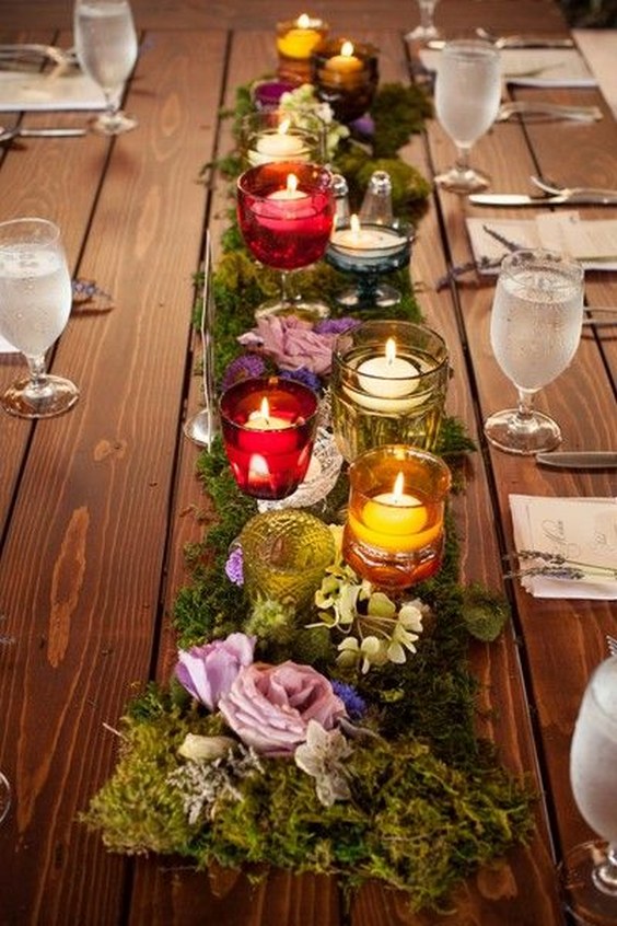 wedding centerpiece idea – moss + flower table runners with colorful candle votives