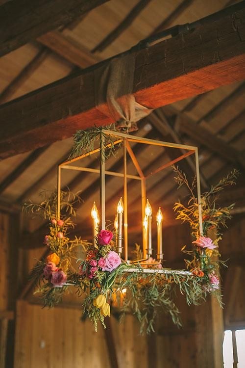 Colorful Summer Wedding in Colorado, Gold Chandeliers with Flowers and Candles