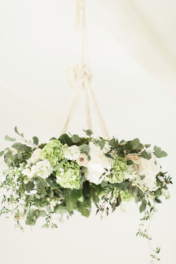 white flowers and greenery wedding chandelier via Katy Melling Photography