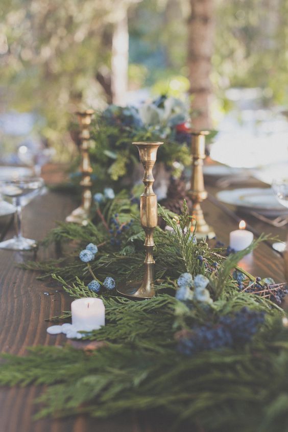 winter candlestick wedding centerpiece via Hazelwood Photo