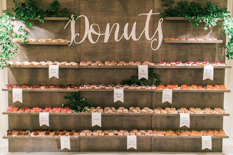 donut wall decorated with floral wedding ideas