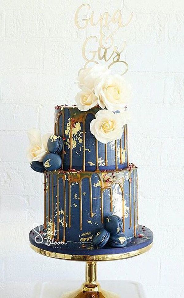 blue and gold drip wedding cake