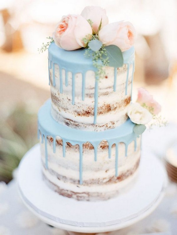 blush pink and blue semi naked drip wedding cake