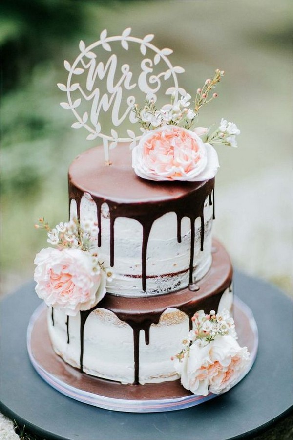 chocolate drip wedding cake with blush floral