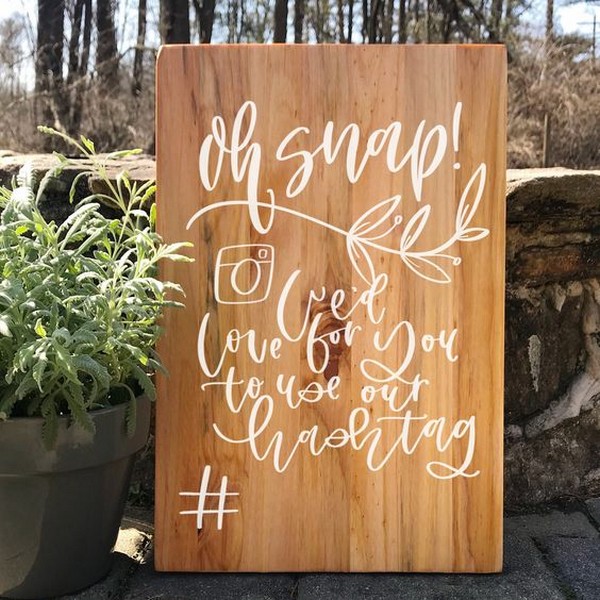 wooden wedding hashtag sign
