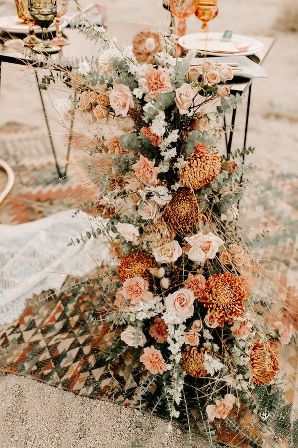 Tree desert wedding elopement with a boho theme and a trendy warm hued color palette