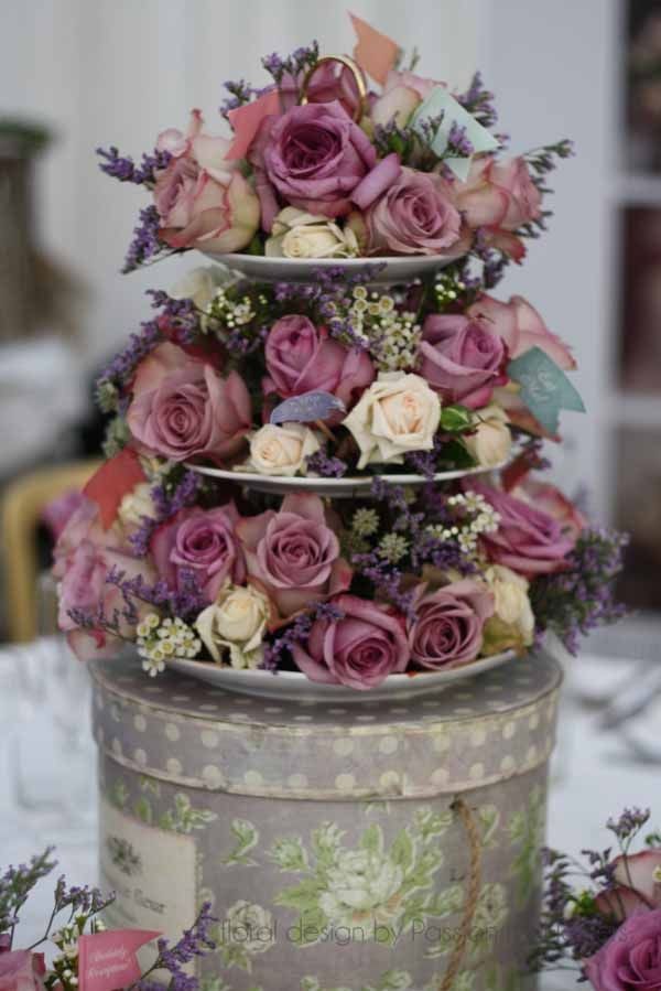 Vintage cake stand with pastel mauve coloured roses