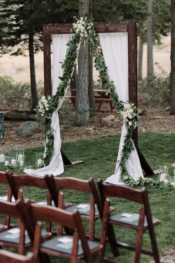 Wedding Arbor with eucalyptus garland and flowers