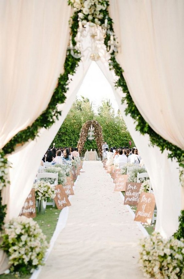 garden themed wedding entrance with garlands