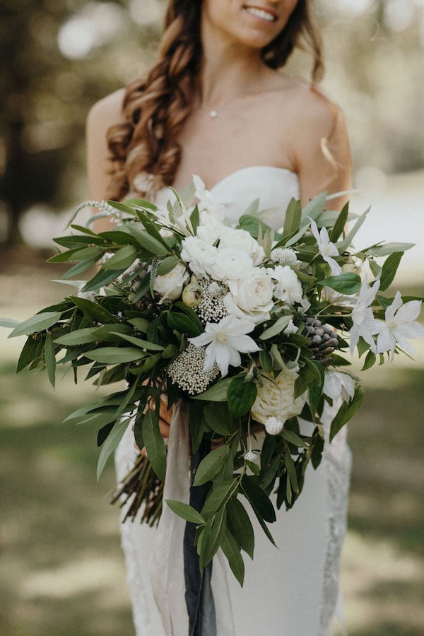 greenery and white bridal bouquet with ribbon bows 1