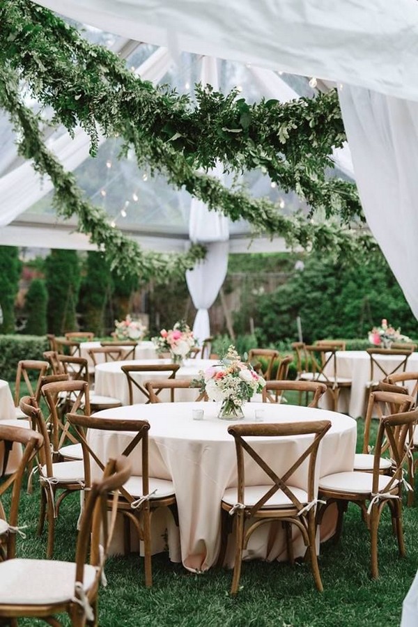 tented wedding ideas with greenery hanging garlands