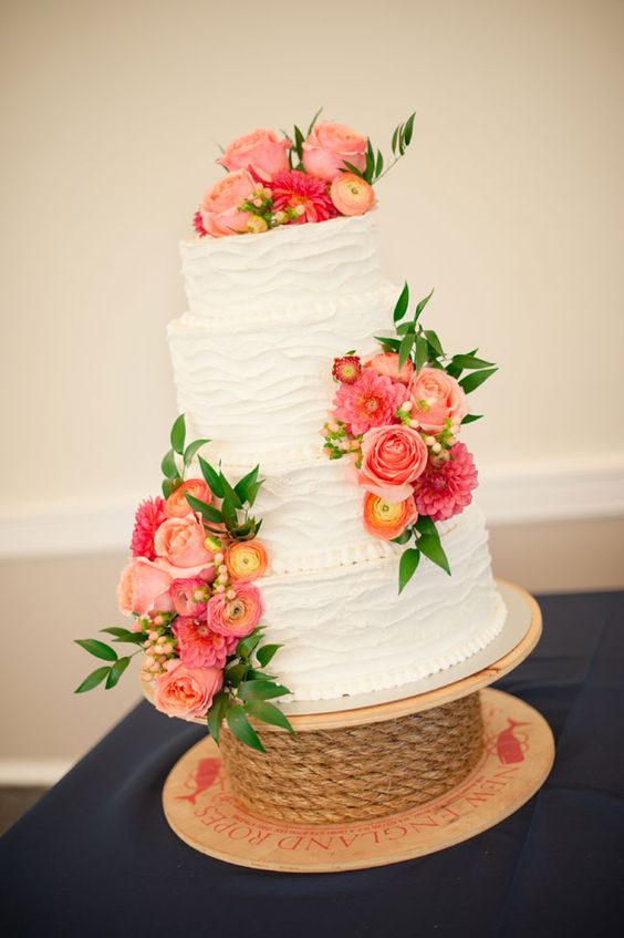 coral and greenery wedding cake