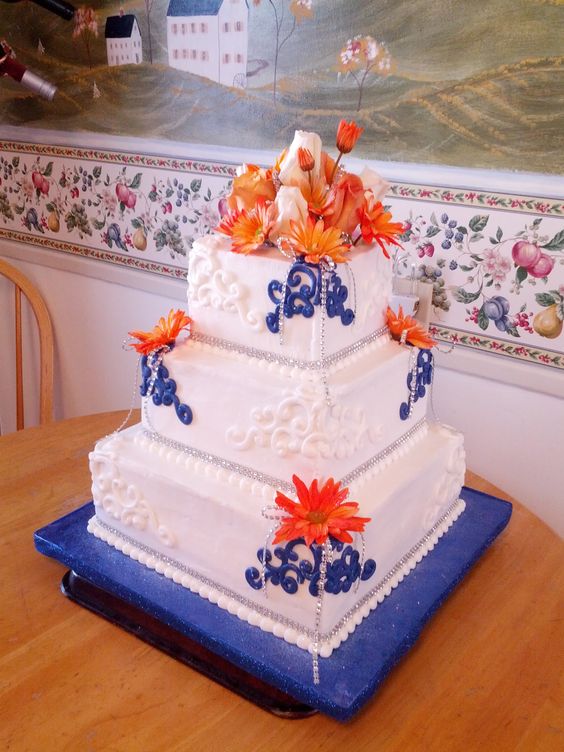 coral and royal blue wedding cake