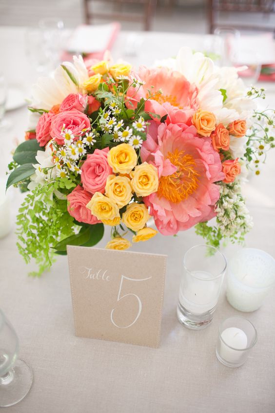 coral and yellow wedding centerpiece
