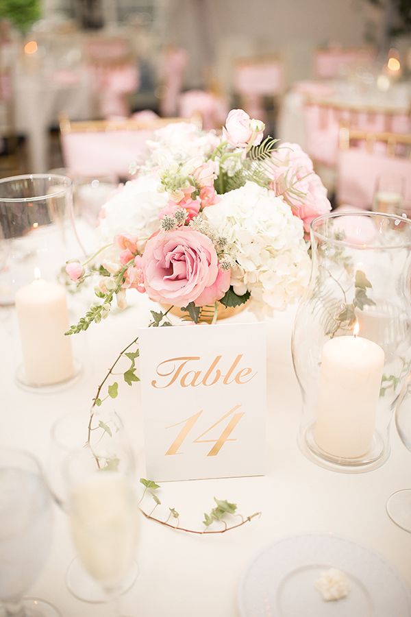 Elegant white, pink and gold wedding centerpiece
