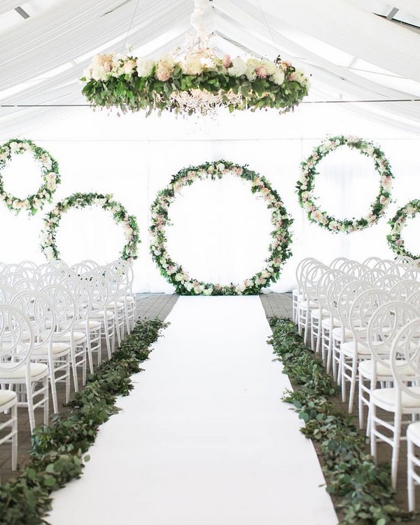 white and greenery circles wedding ceremony backdrop 21