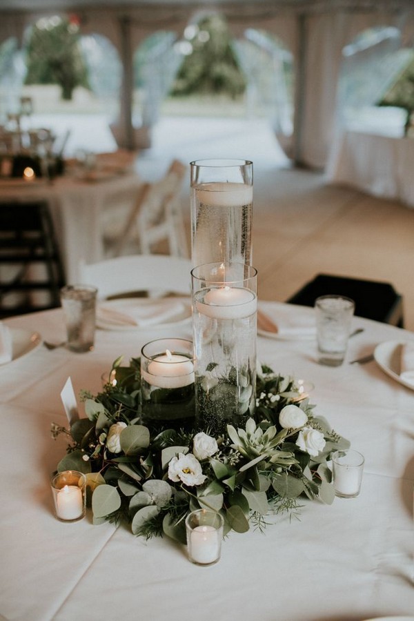 Green and white wreath and candle centerpiece