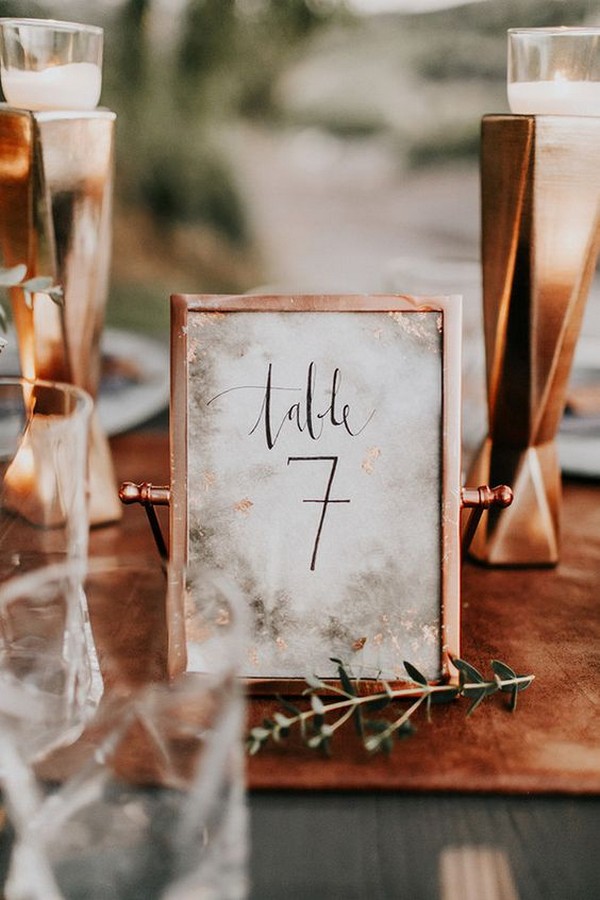 modern wedding welcome sign with copper stand