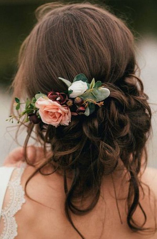 romantic updo wedding hairstyle with florals