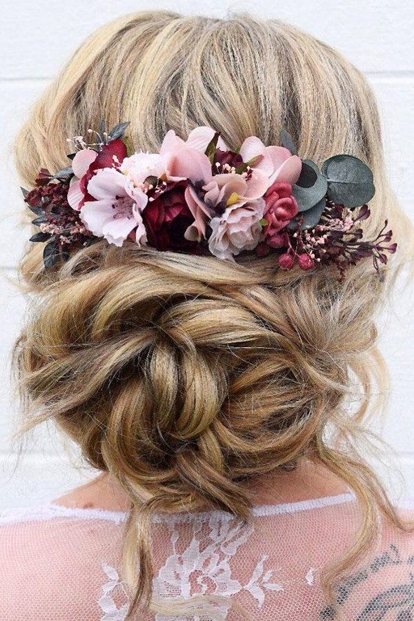 summer wedding hairstyles volume messy low bun with flowers wb_upstyles