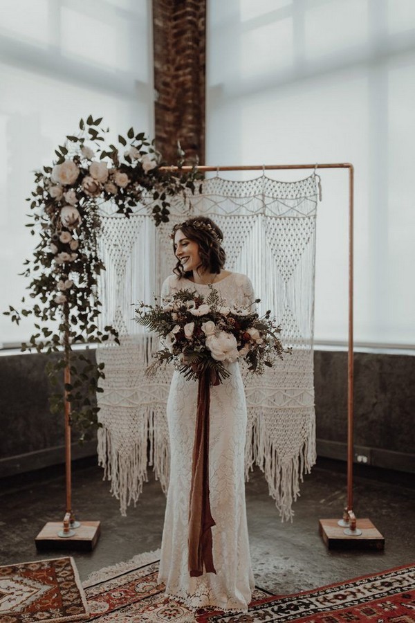 Romantic modern + boho backdrop featuring macrame and white roses
