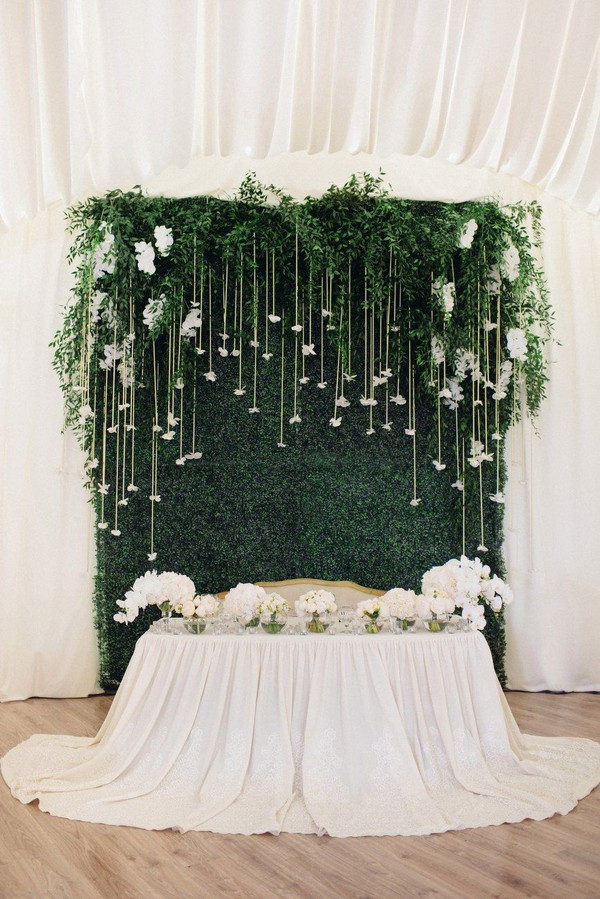 ivory and greenery sweetheart table decor