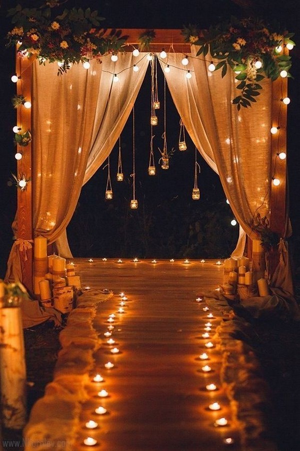 rustic country night wedding arch with lights
