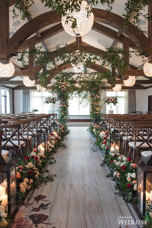 vintage greenery indoor wedding ceremony decor
