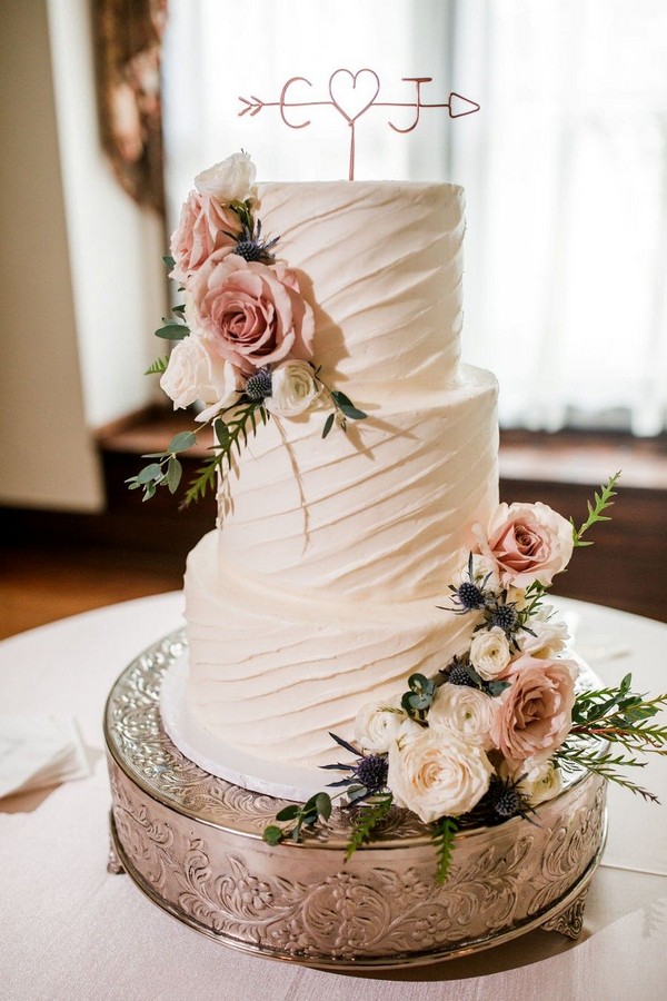 buttercream wedding cake with pink roses