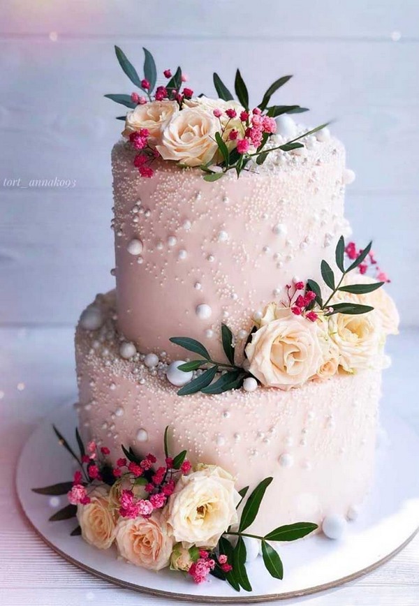 pink pearl wedding cake with flowers
