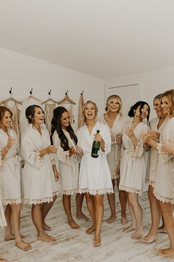 Bridesmaids, bridesmaid getting ready, getting ready, white wedding, bridal robes, champagne pop