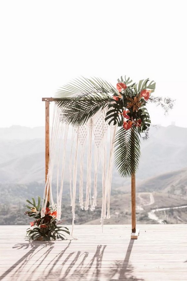 greenery tropical wedding arch with gilded monstera leaves