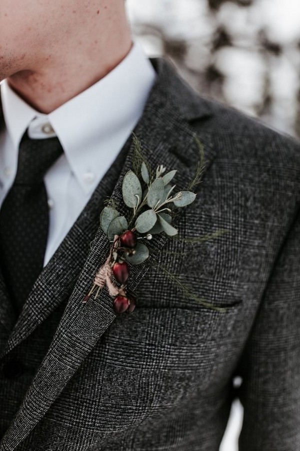 grey fall and winter groom wedding suit and eucalyptus boutonniere
