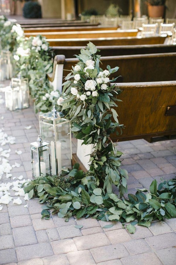 outdoor white roses and green eucalyptus wedding aisle decoration 12