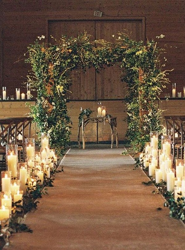 aisle lined with candles and plants by Apotheca Flowers, captured by Lindsay Hackney Photography