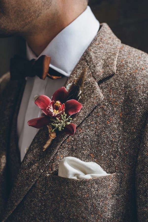 grey fall and winter groom wedding suit and pink boutonniere