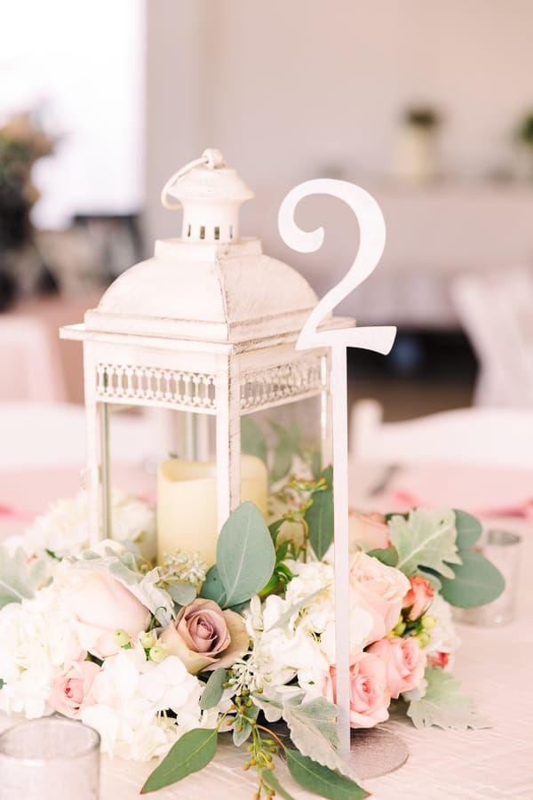 white lantern and blush pink wedding centerpiece